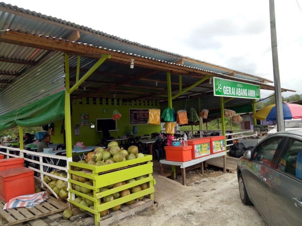Photo of Gerai Kelapa Bakar Kak Tini (Lokan Bakar & Puding Kelapa) - Lahad Datu, Sabah, Malaysia background